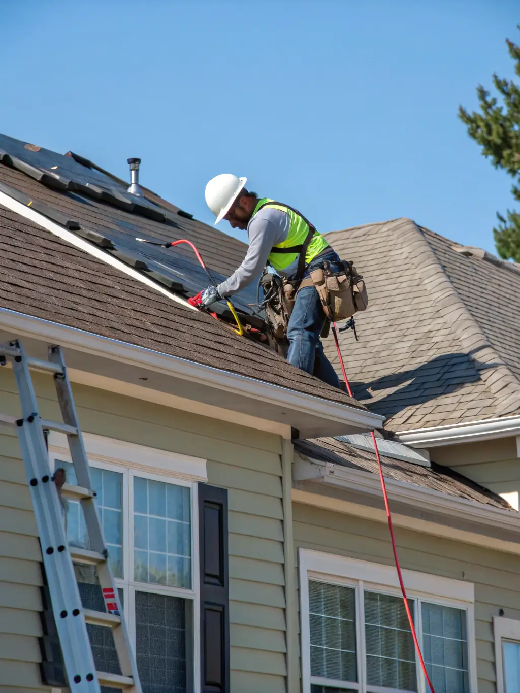 A professional photograph showcasing a UrazPro roofing team installing high-quality shingles on a residential home in Texas, emphasizing their expertise and attention to detail.